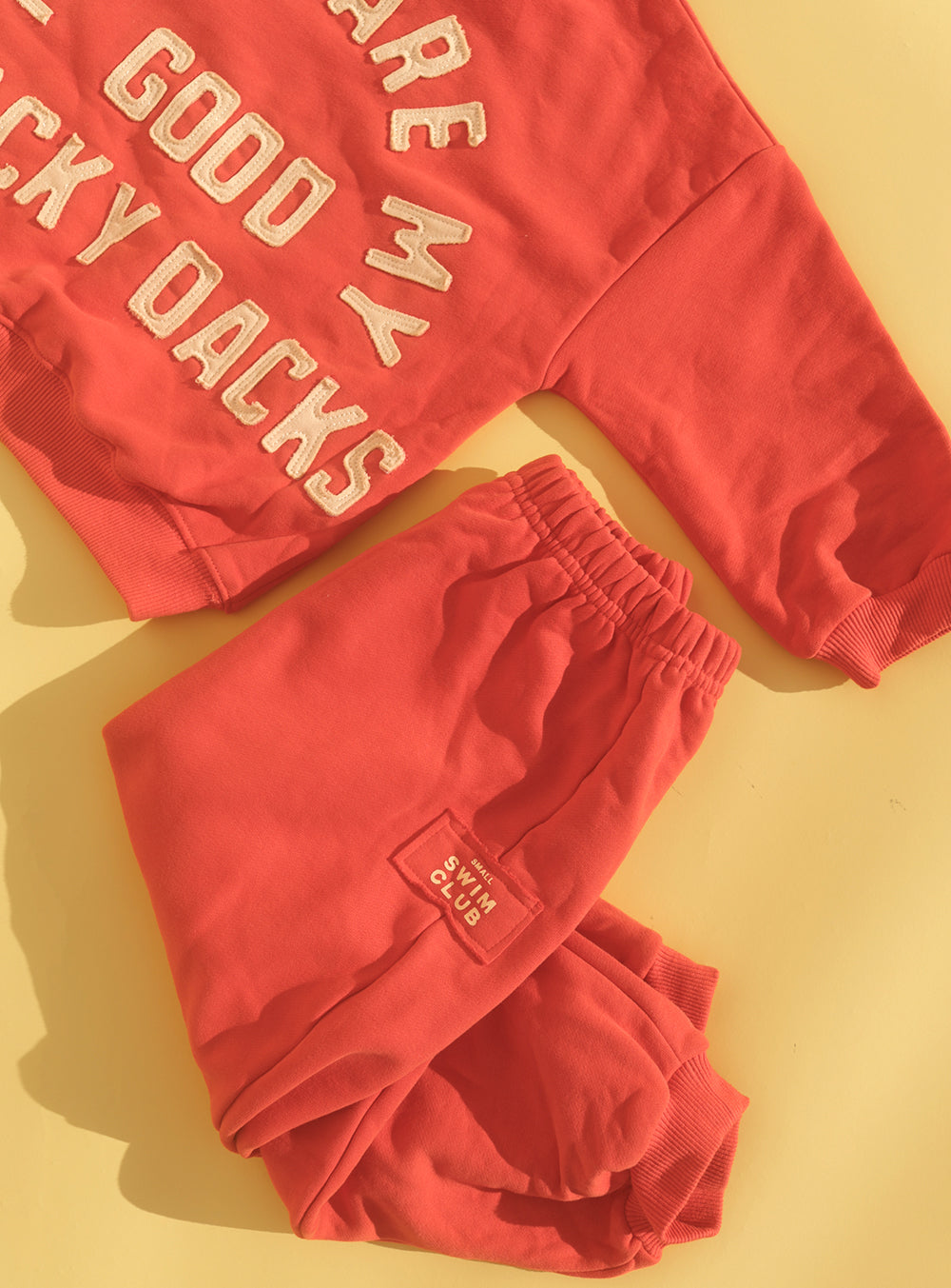 Good Tracky Dacks Red Cream